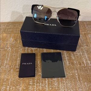 Prada Elegant Black and Gold Eyewear